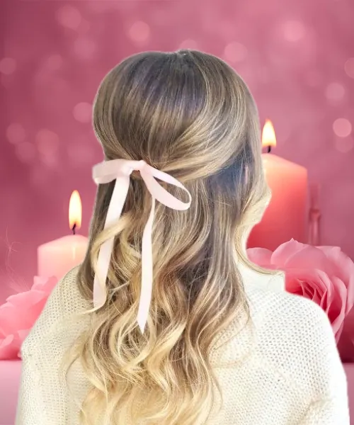 A delicate pink hair ribbon for a romantic evening