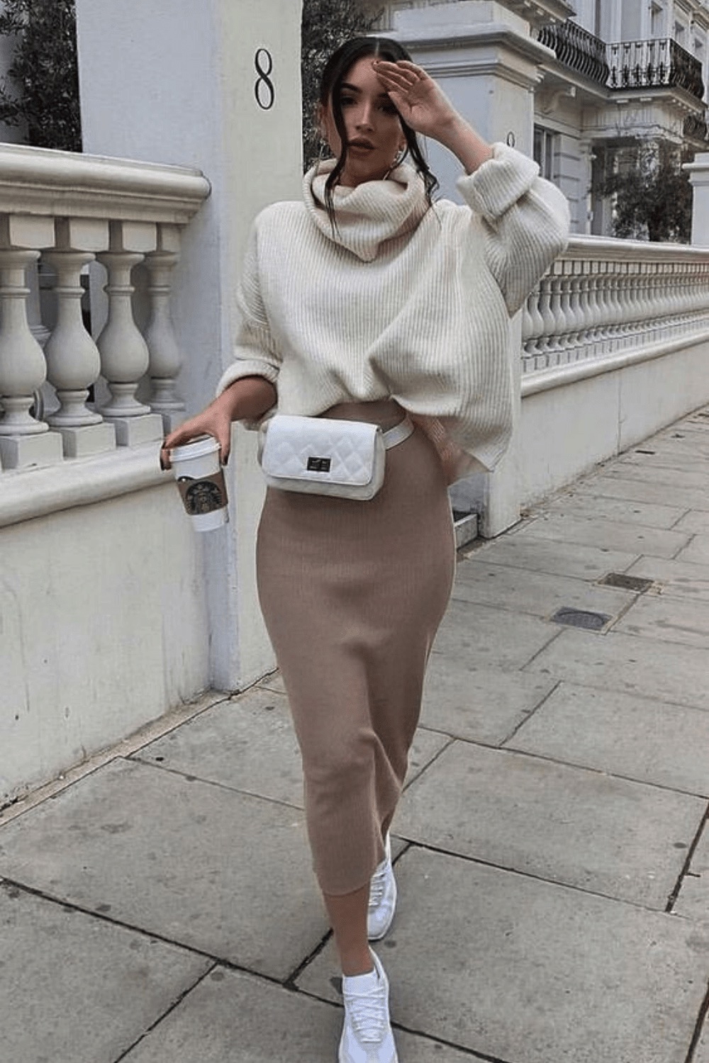 Choose a white sweater with a wool skirt, to feel comfortable on long walks