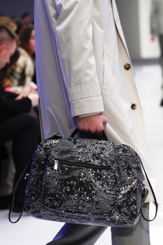 Should men wear handbags? Editorial for cold season.