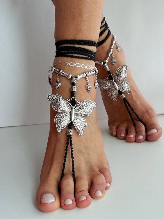 The best female accessories and jewelry for our beloved legs. Chains with stones and curls decorate any fashionista